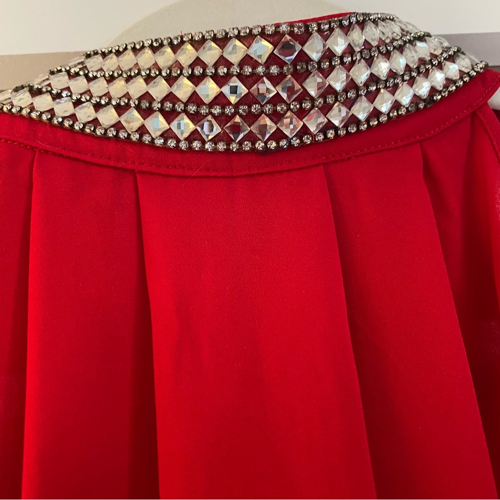 Red sleeveless crystal collared top